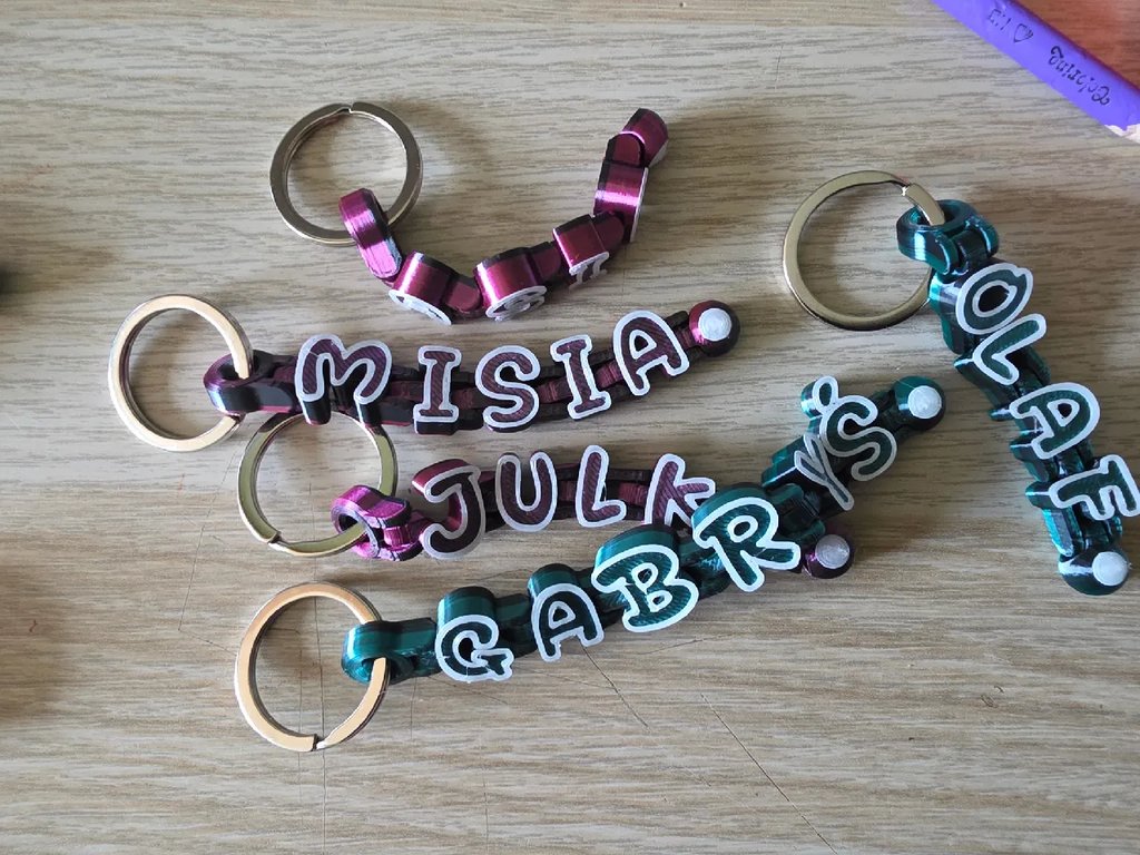 Гибкий брелок с надписью (сочлененный) v2.0